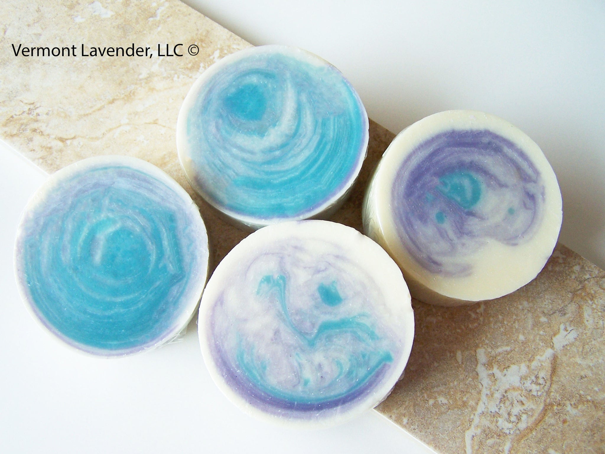 Lavender Linen round goat milk soap made by Vermont Lavender is a round soap bar using lavender essential oil plus goat milk powder for this moisturizing handmade soap.