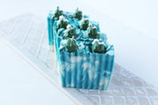 An uplifting clean scent of balsam pine and fraiser fir needle essential oils 