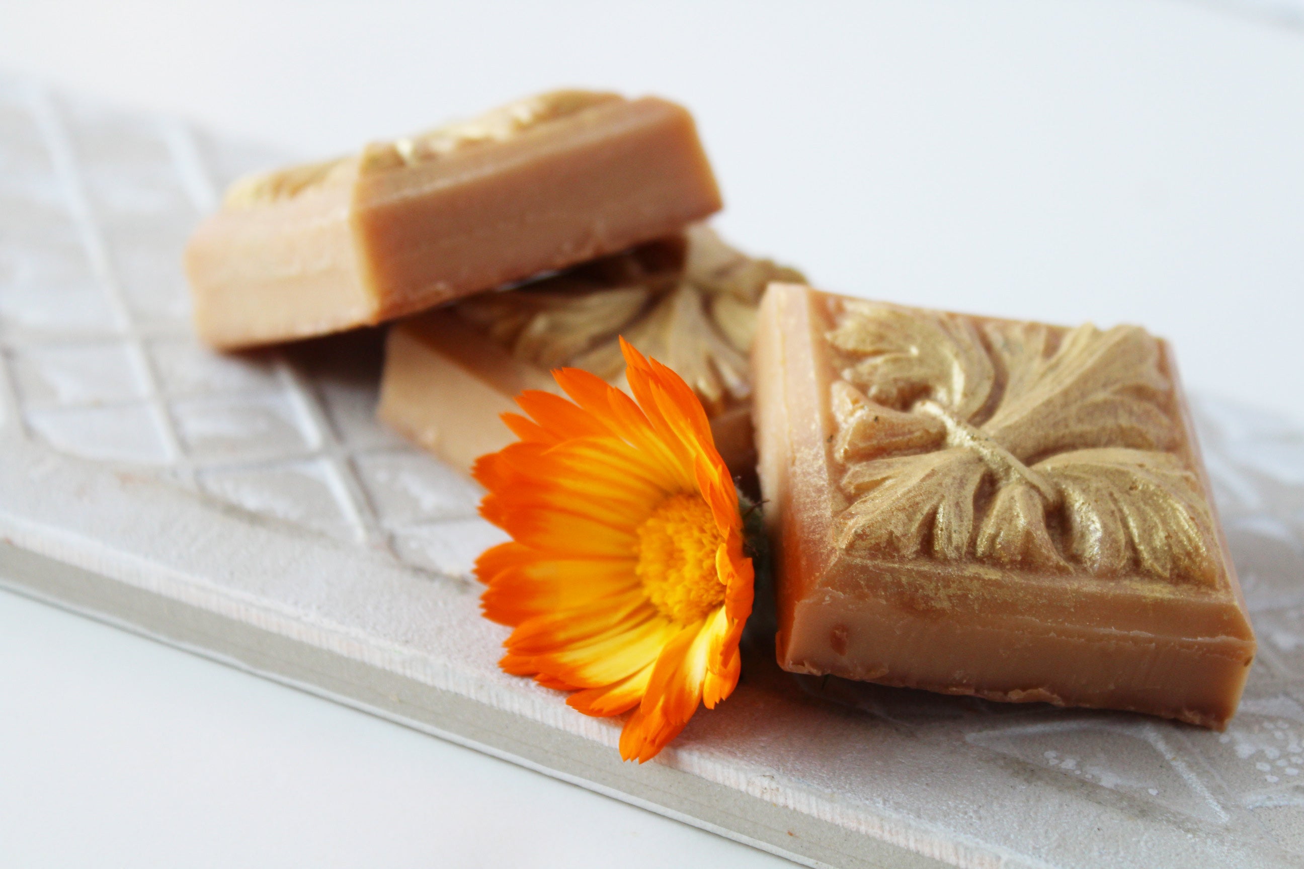 Orange pumpkin fleur de lis flower design small guest soaps by Vermont Lavender