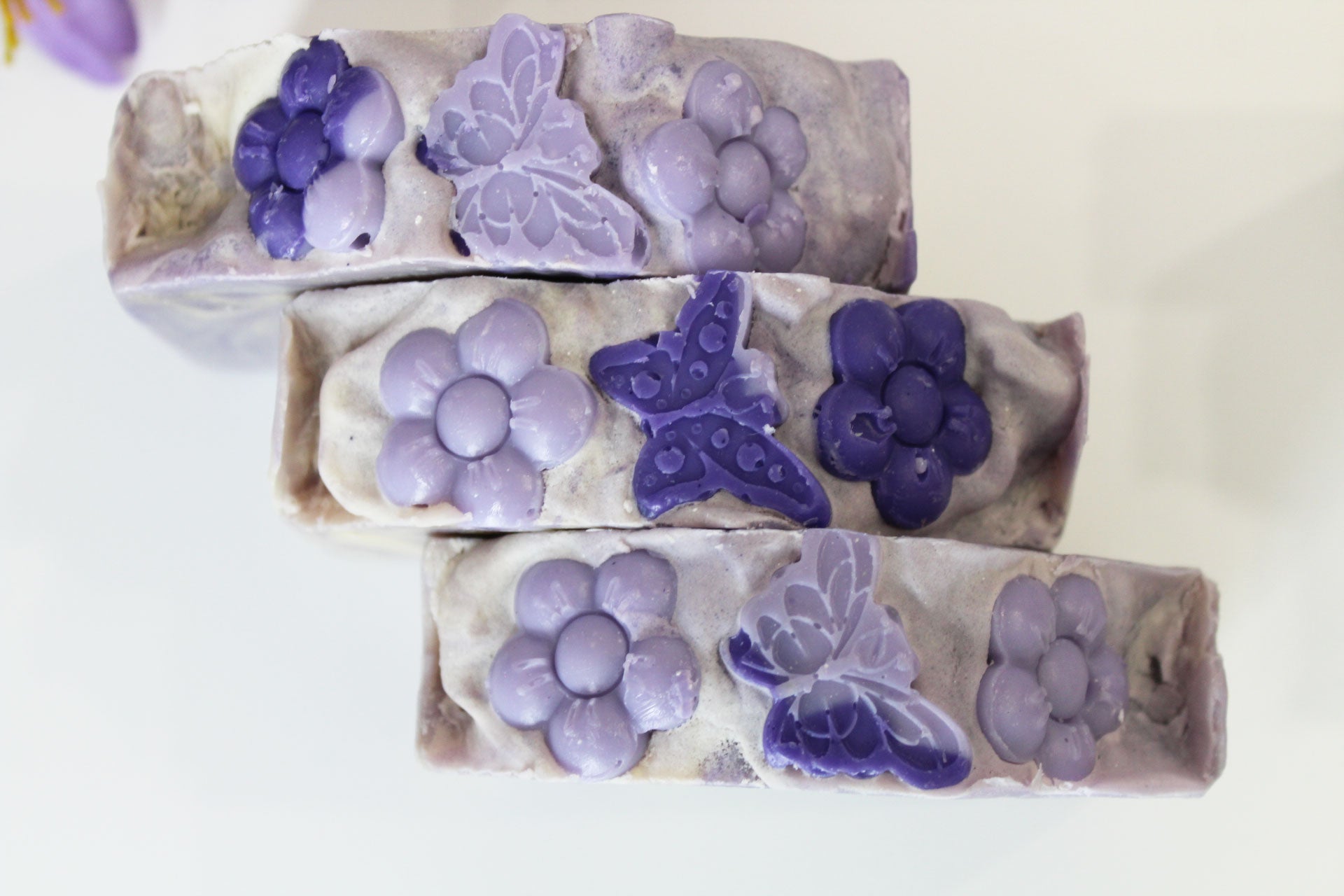 lavender goat milk soap with butterfly flower cold process soap top view by Vermont Lavender