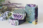 Lavender linen confetti soap bar with flower soap embeds on top and color variations of soap flecs in the soap bar by Vermont Lavender