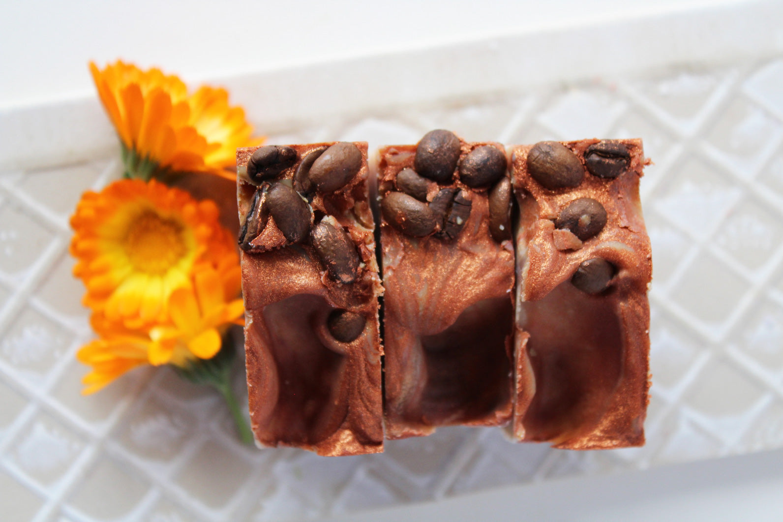 Pumpkin spice latte coffee soap bar by Vermont Lavender top view with coffee beans 