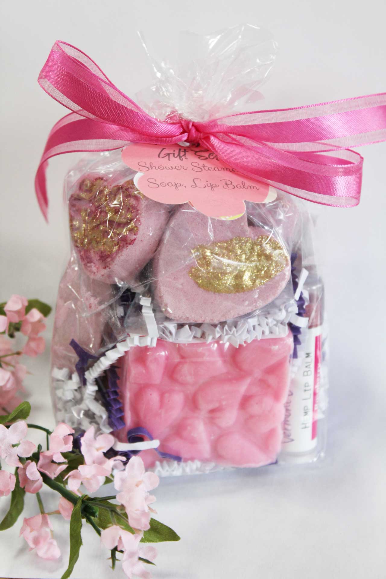 Shower steamer gift bag with soap and raspberry lip balm