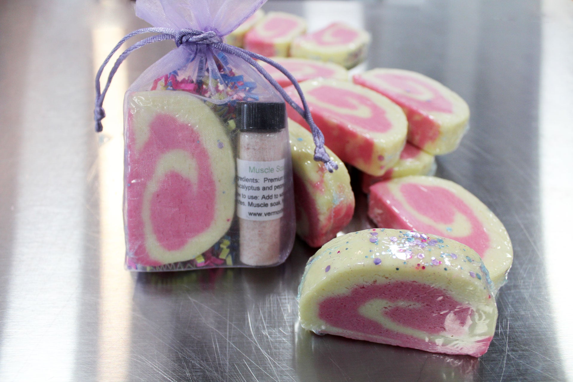 Raspberry jam solid bubble bar jelly roll style with muscle soaking bath salts in organza purple bag