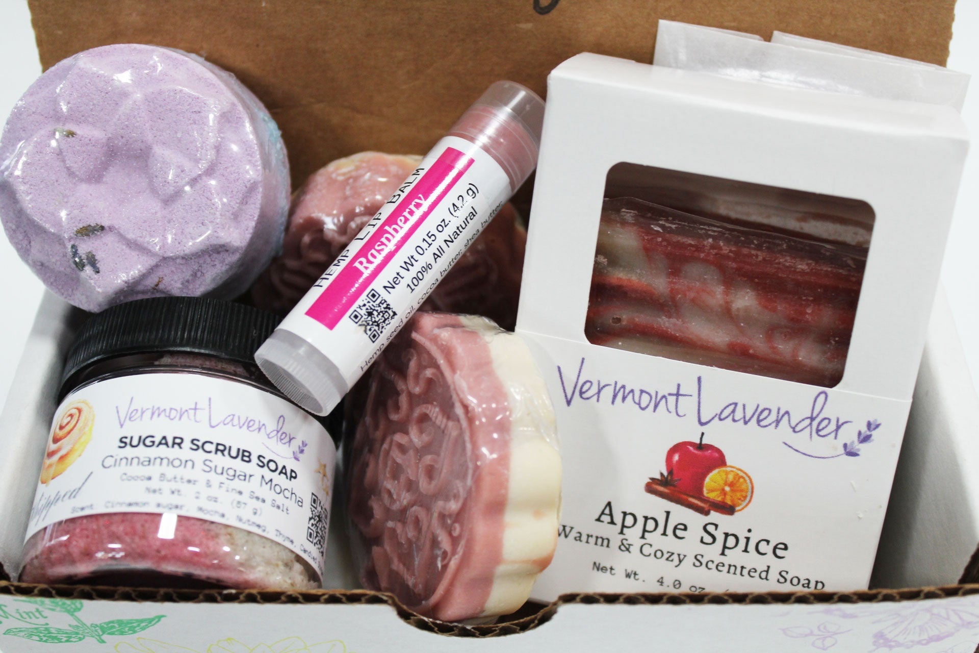 This handmade holiday spa box features warm cinnamon sugar mocha, apple spice artisan soap, peppermint, lavender, and a refreshing shower steamer. Perfect for Christmas gifting, teachers, coworkers, and self-care lovers. Handcrafted in Vermont.