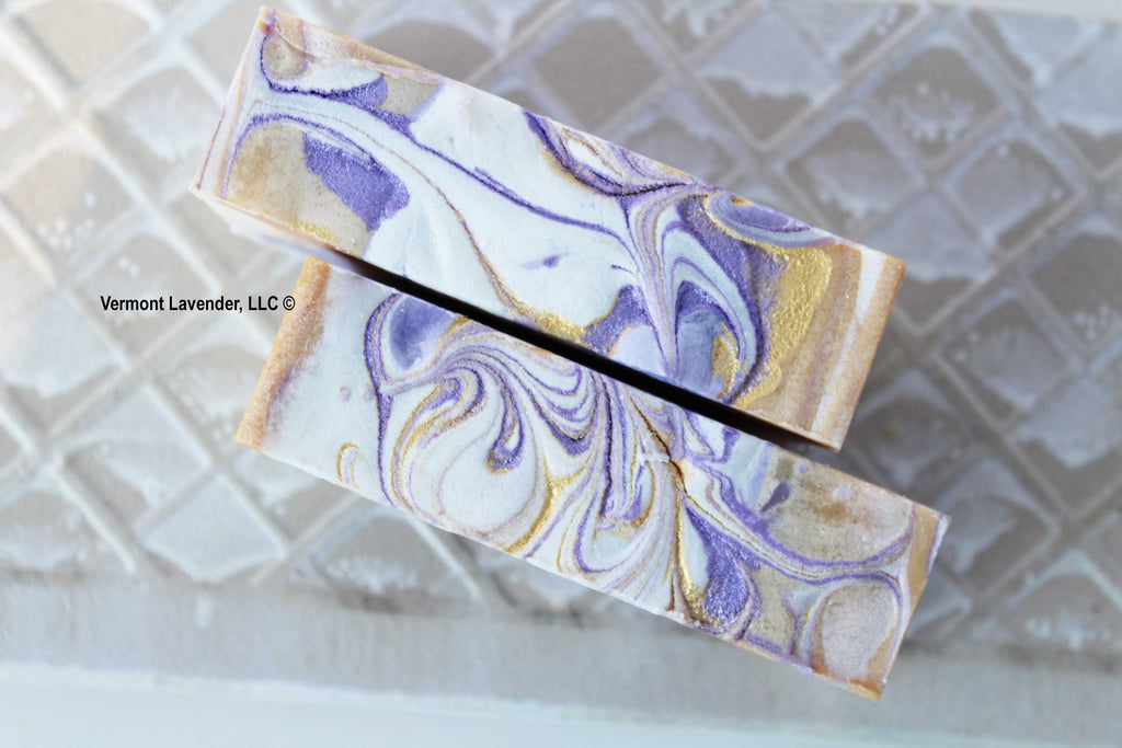 top view of lemon lavender soap with purple and gold swirls
