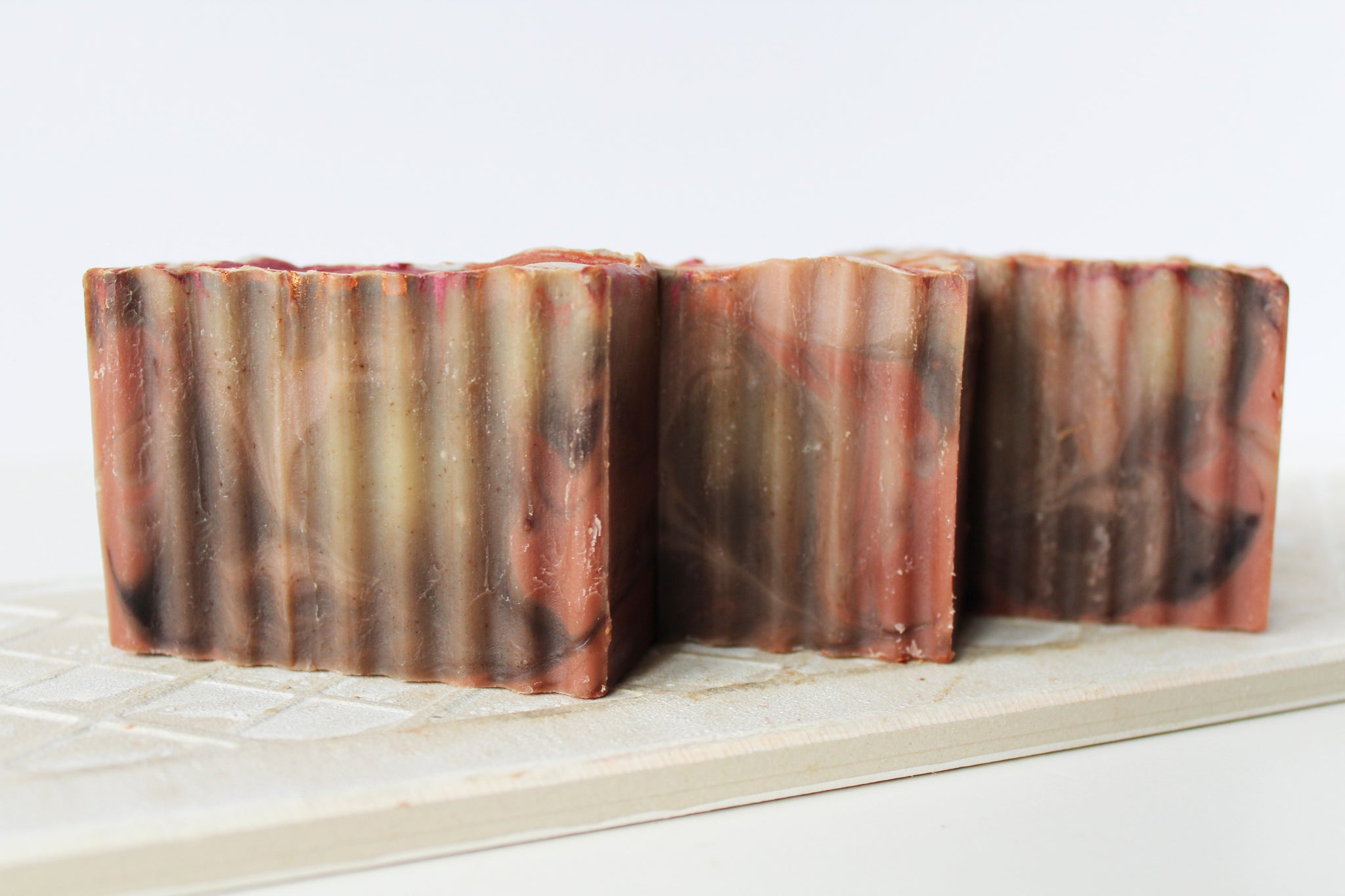 Maple Sugar Vanilla Scent | Vermont Maple Wood Autumn Amber Soap side front view shows brown red orange color swirl pattern